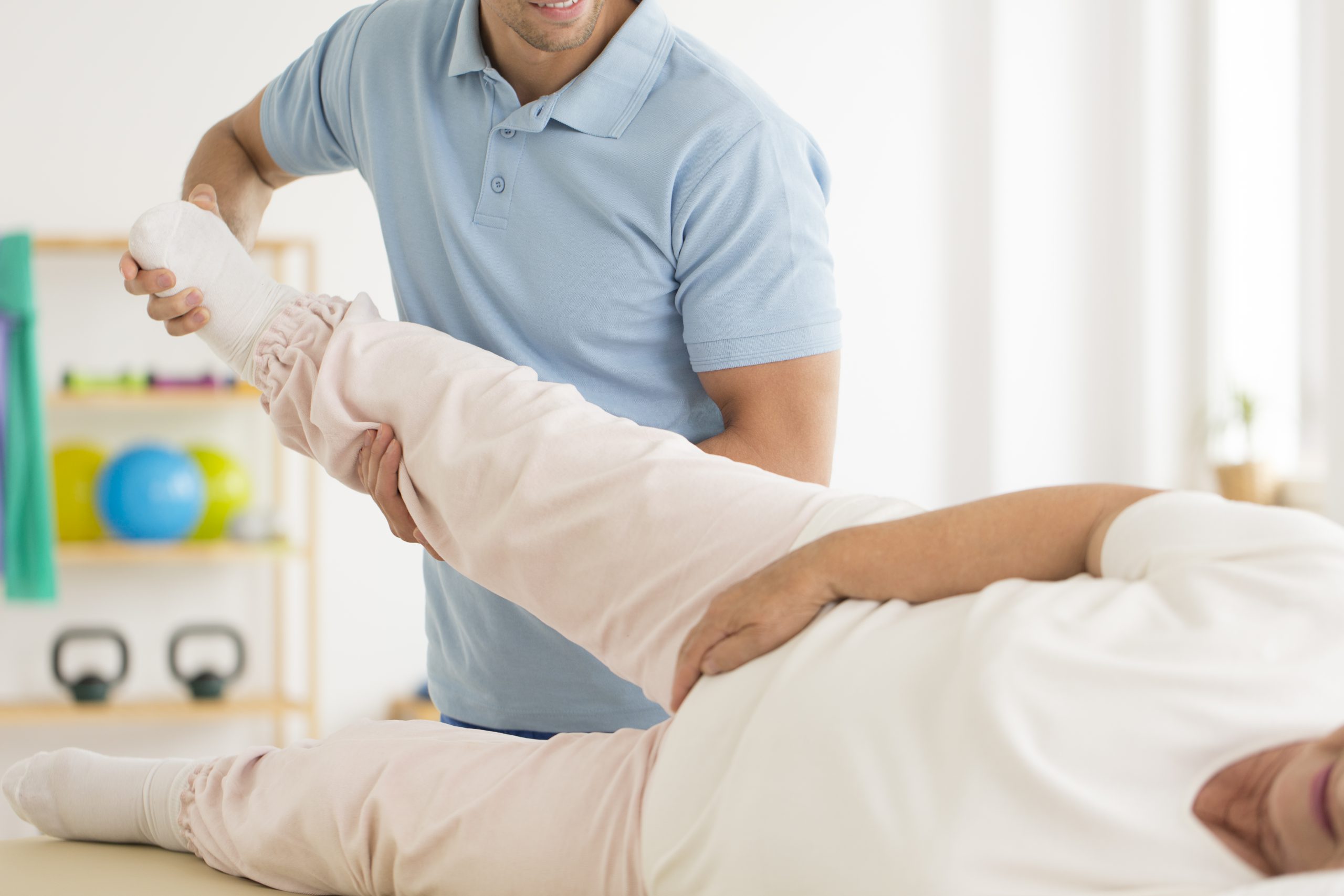 Personal physiotherapist rehabilitating joints